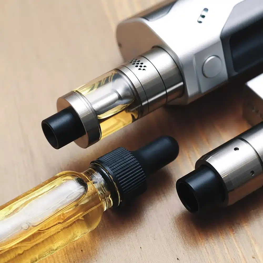 Vaping devices and oil vial